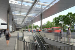 Die Visualisierung zeigt die große und breite Mittelinsel des neuen ZOB mit transparentem Dach und den Rolltreppen hinab zum Bahnhof.