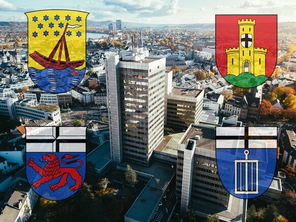 Die Fotomontage zeigt die Wappen der vier Bonner Stadtbezirke vor dem Hintergrund des Stadthauses und einer Stadtansicht