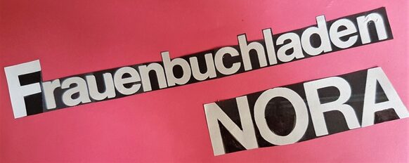 Schriftzug "Frauenbuchladen NORA" am Schaufenster des Ladenlokals in der Wolfstraße